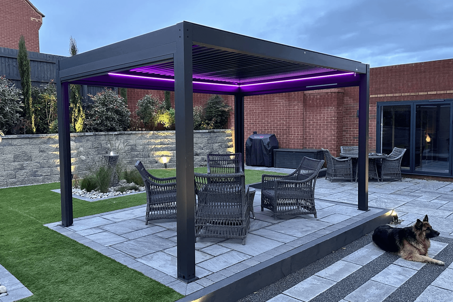 Modern garden with Pergola and LED lights turned on