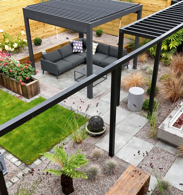 Modern garden with pergola and landscaped planting